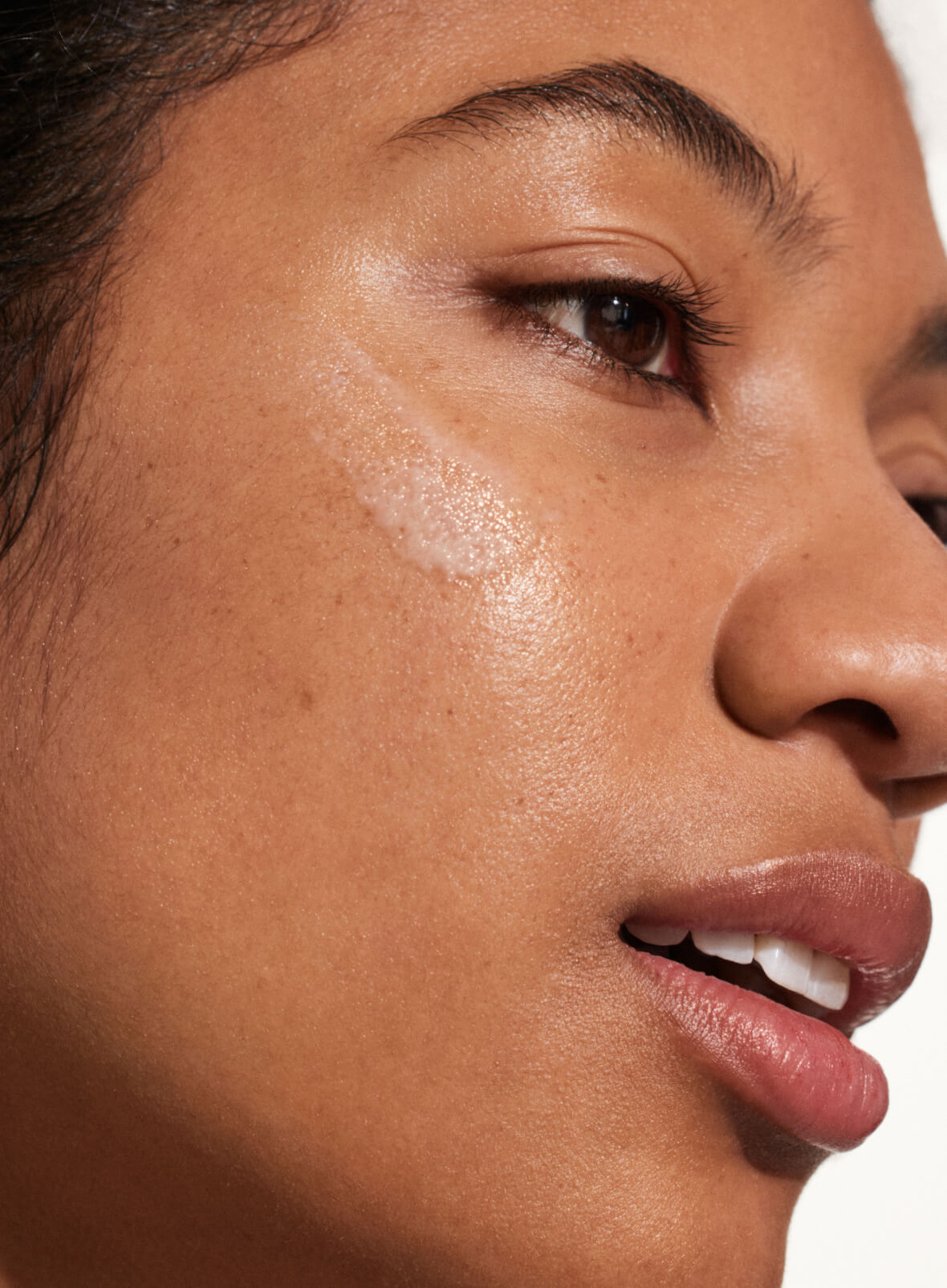 Supergoop! Daily Dose Vitamin C + SPF 40 Serum on model