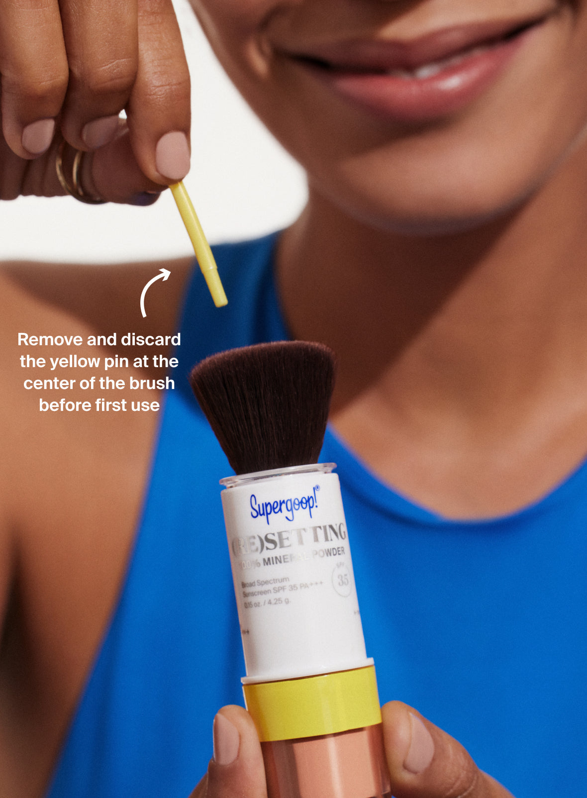 (Re)setting 100% Mineral Powder SPF 35 in shade Translucent Light Medium Deep annotation saying remove and discard the yellow pin at the center of the brush before first use