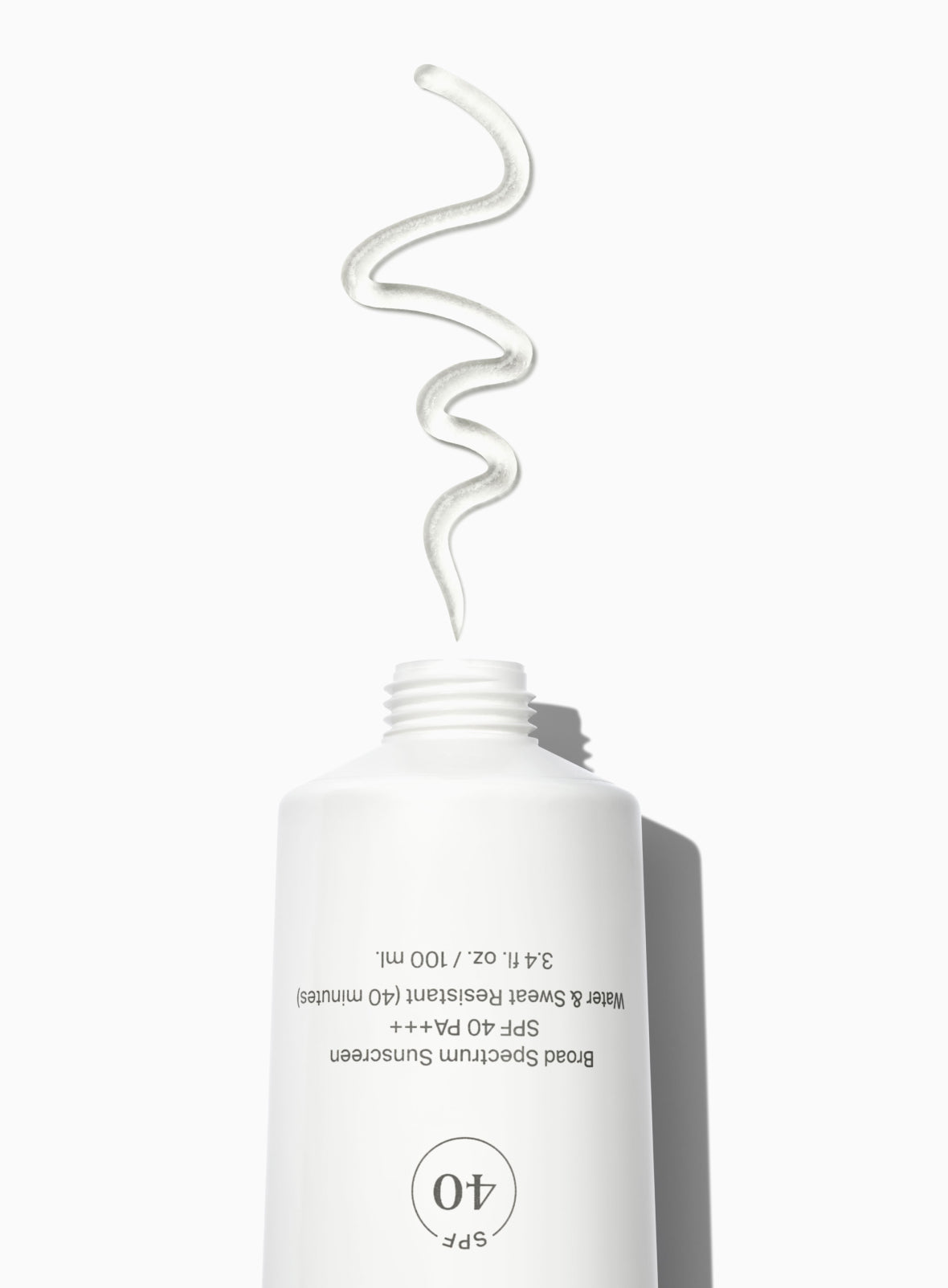 Supergoop! Unseen Sunscreen Body SPF 40 packshot with textures